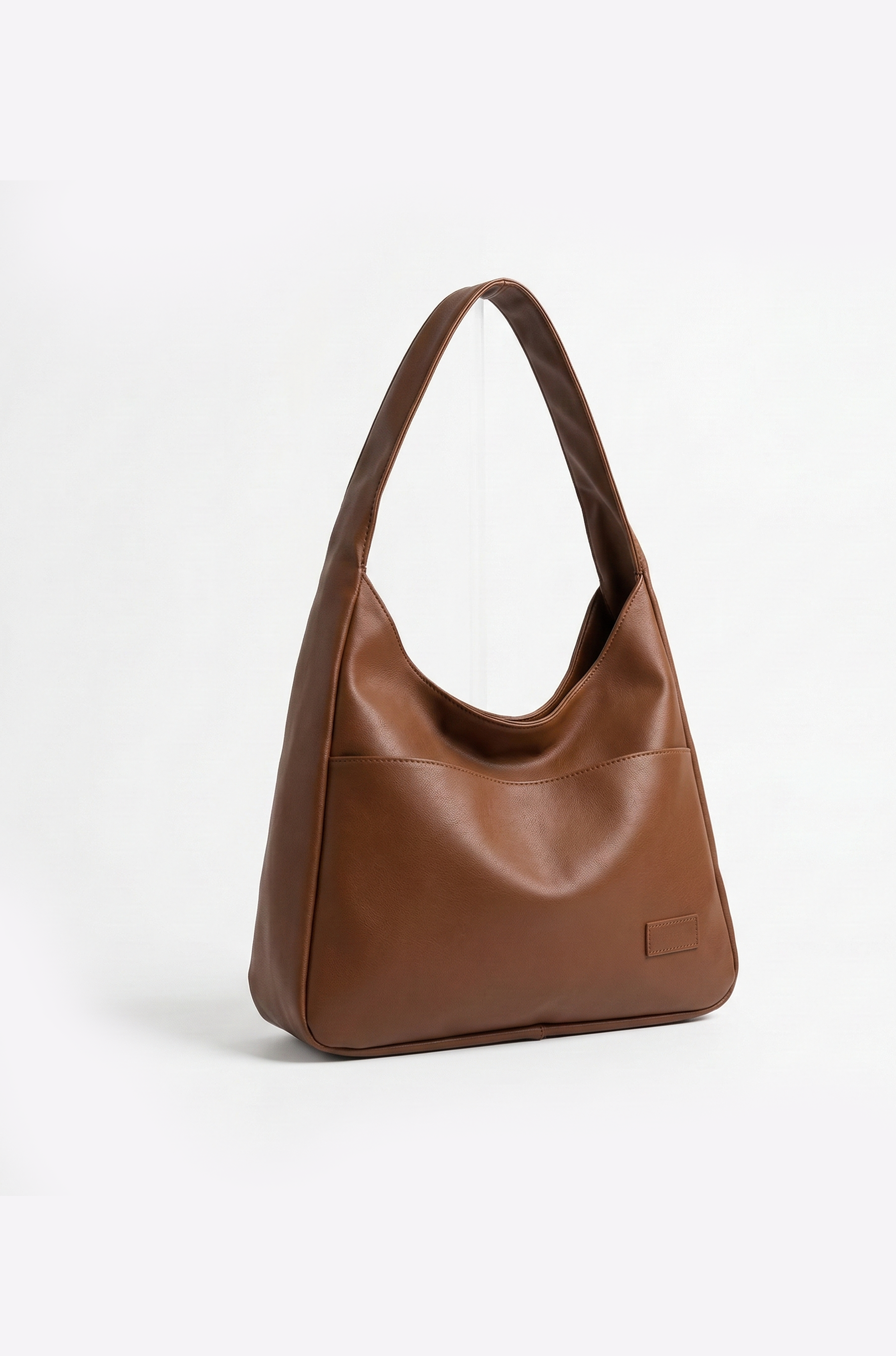 Brown leather handbag on a white background