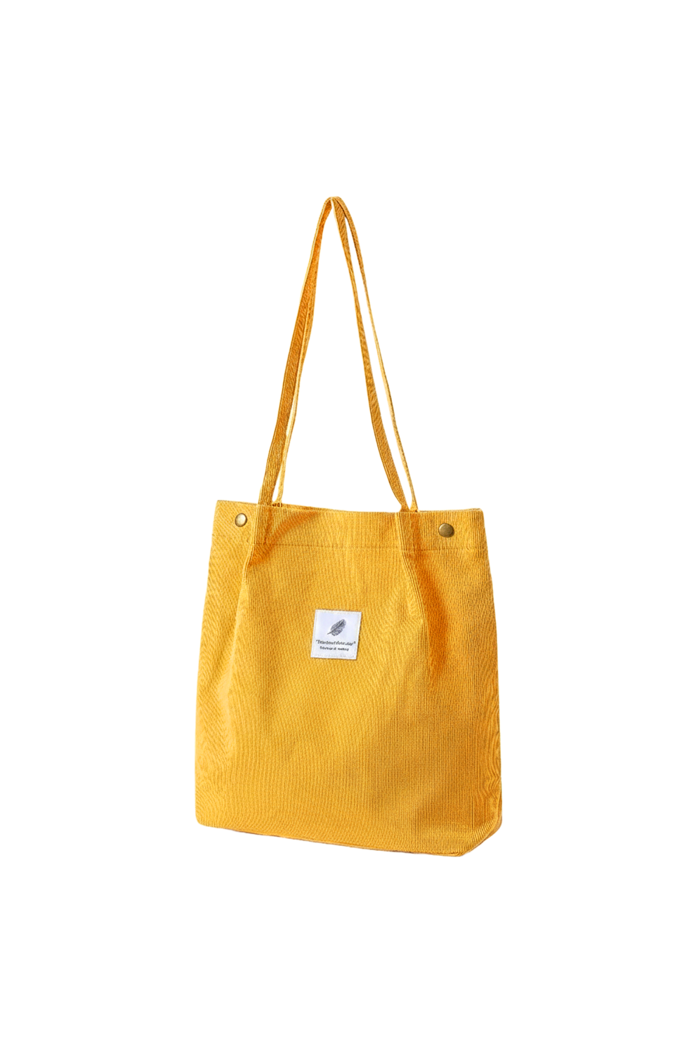Yellow tote bag with a small white label on a white background
