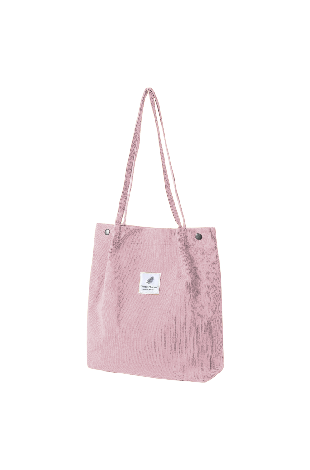 Pink tote bag with a small label on a white background