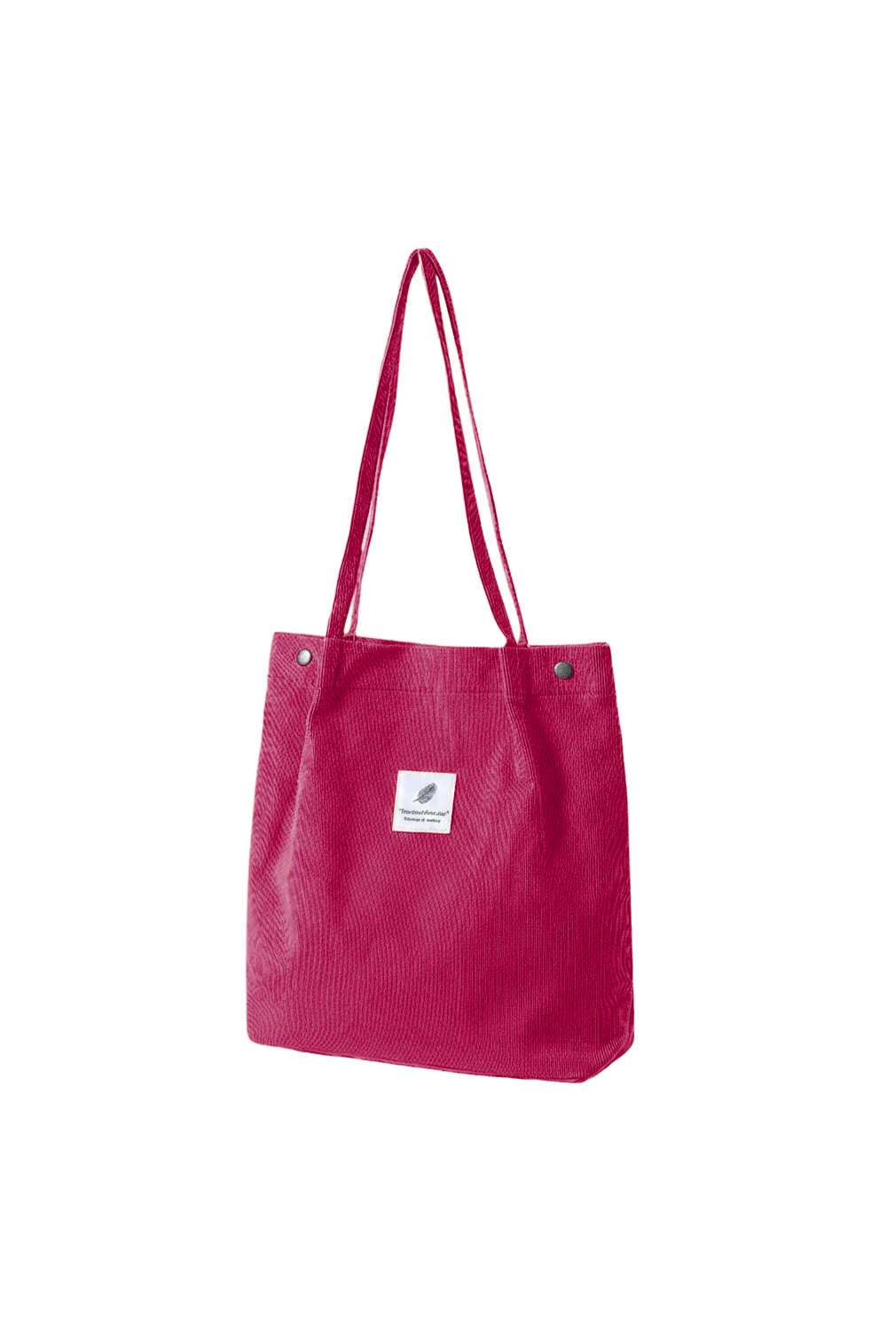 Pink tote bag with a small white label on a white background