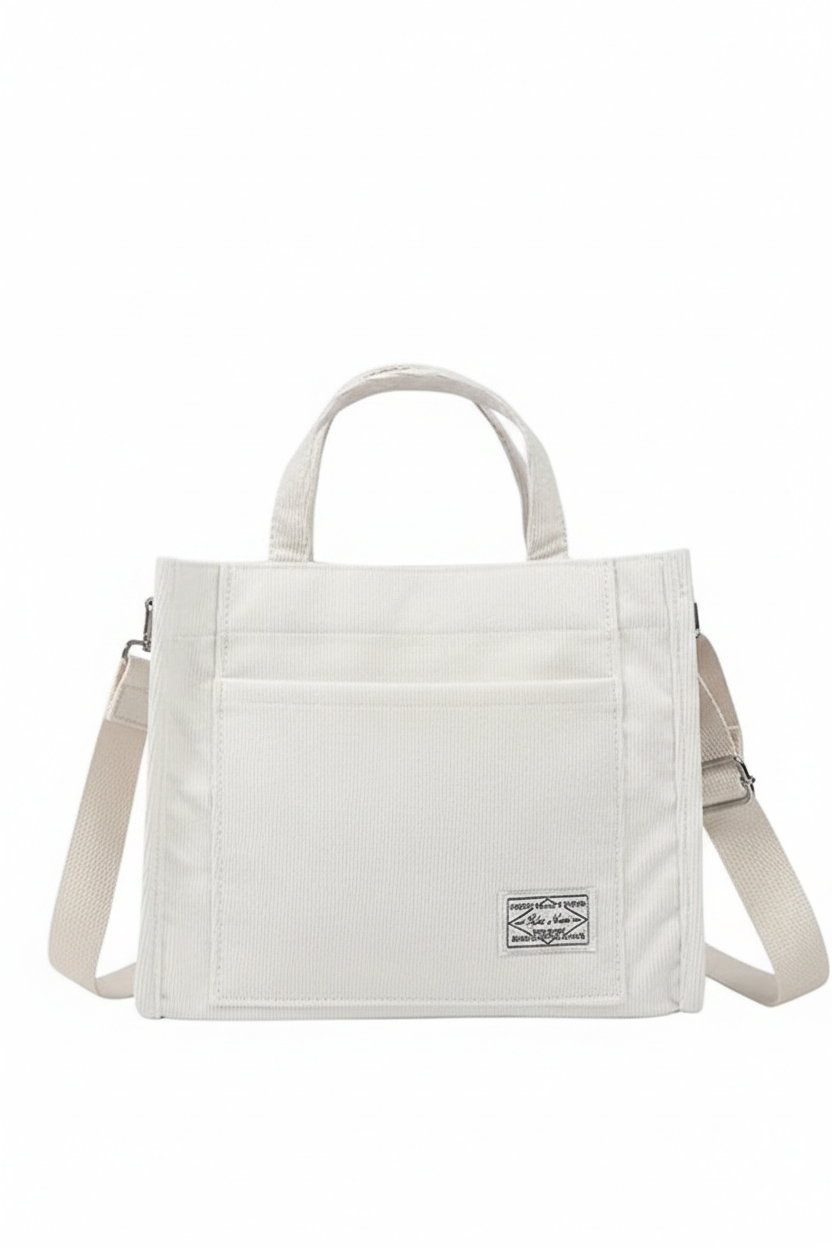 White tote bag with shoulder straps on a white background